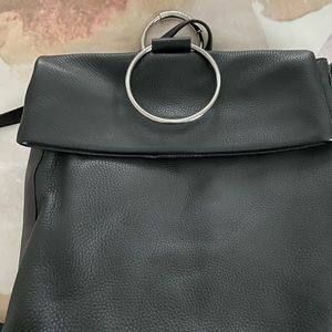 Backpack that can convert to should bag. Roomy all leather